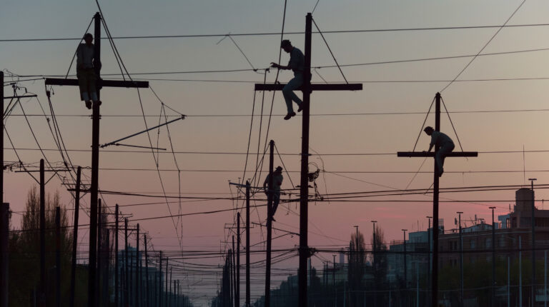 Crucifixion reimagined, common people like workers and everyday individuals subjected to this ancient form of punishment, exploring the fiction and harsh reality of crucifixion taken to its limits." General Shot: Description: The camera pans over a surreal urban landscape at dusk where ordinary city structures are transformed into cruciform shapes. Construction beams, telephone poles, and even street lamps are repurposed into crosses. This dystopian vision draws inspiration from Fritz Lang’s Metropolis, where the city itself becomes a character in the narrative of oppression. Medium Shot: Description: Focus on a group of workers, each carrying out their daily tasks, unaware they're gradually being elevated onto these crosses. The shot captures their mundane activities turning into a silent protest against their fate, mirroring the existential dread found in Michelangelo Antonioni’s films. Detail Close-Up Shot: Description: A close-up on the hands of a worker, gripping a cruciform beam, with the head of a protruding screw cutting into his palm, hinting at the impending crucifixion. The visual metaphor of the nail and the wound evokes the intense, personal suffering portrayed in Ingmar Bergman’s close-ups, revealing pain in its most intimate form. Creative Innovative Shot: Description: Use a composite frame showing multiple layers of activity: the bottom layer shows the bustling city life continuing indifferently; the middle layer focuses on the workers being lifted; the top layer displays the sky turning ominously dark as if mourning the scene below. This method, influenced by the multilayer narratives of Alejandro González Iñárritu, symbolizes the multiple layers of human suffering and societal ignorance. This sequence not only redefines the concept of crucifixion but also criticizes modern society’s indifference to the suffering of the ordinary, merging historical symbolism with contemporary visual storytelling to provoke thought and empathy. --chaos 60 --ar 16:9 --style raw --stylize 700 --weird 1800 --v 6 Job ID: c0491ed3-4272-461c-8a80-4b028d8f157e